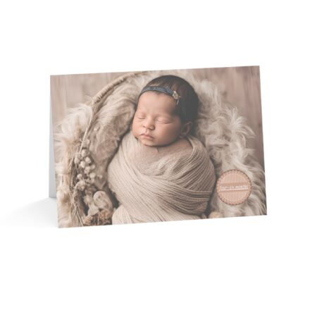 Picture of Hispanic Appearing Baby on Card, 4-6 Months with baby wearing a knit hat on a beige blanket with the words four-six months in a medallion on the front of the card.